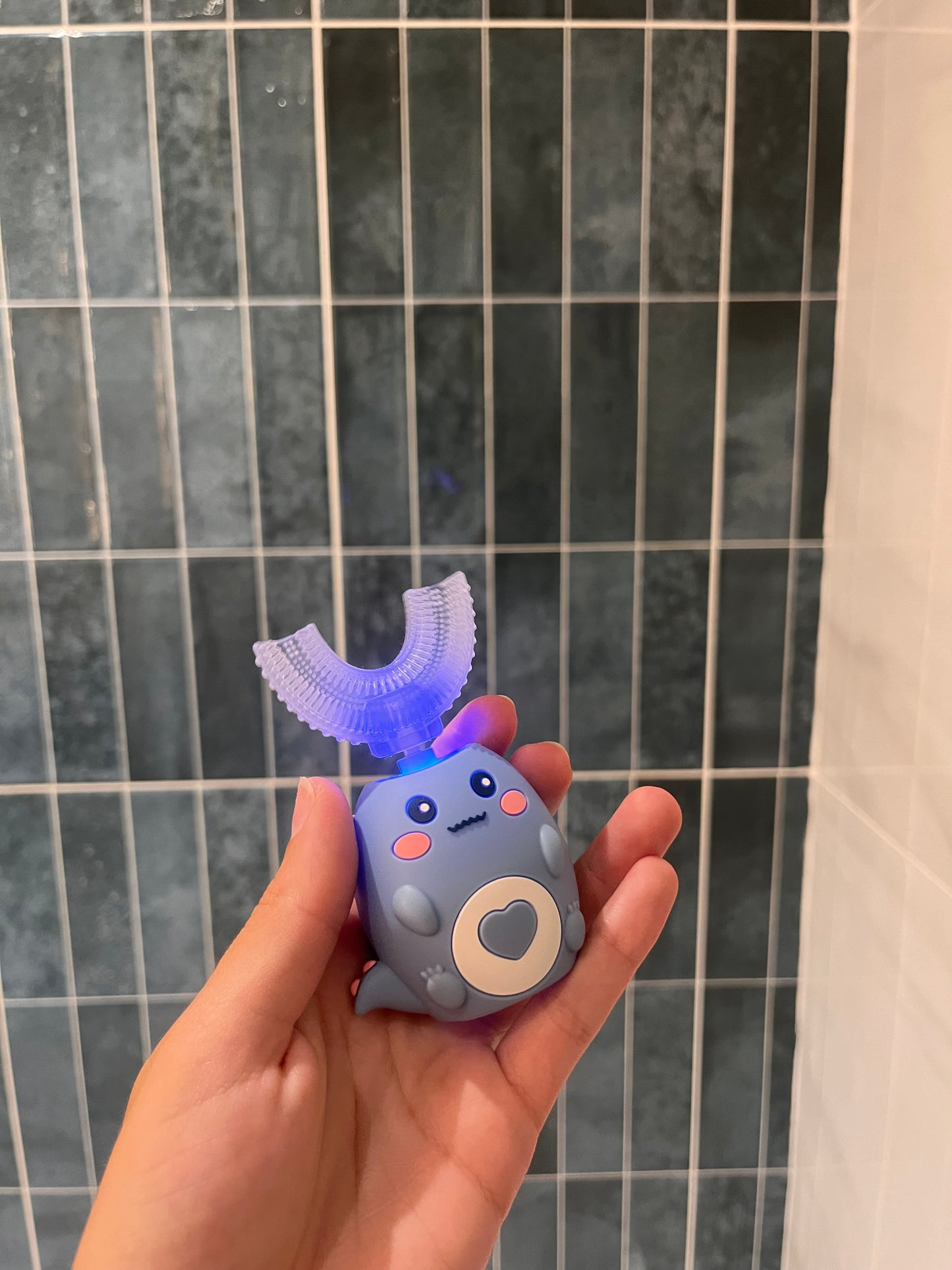 Petite Dent - La brosse à dents électrique en U qui transforme le brossage en jeu